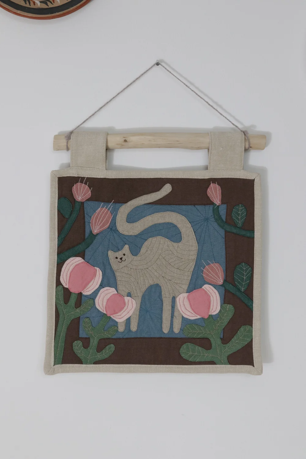 Makatka z burym kotem