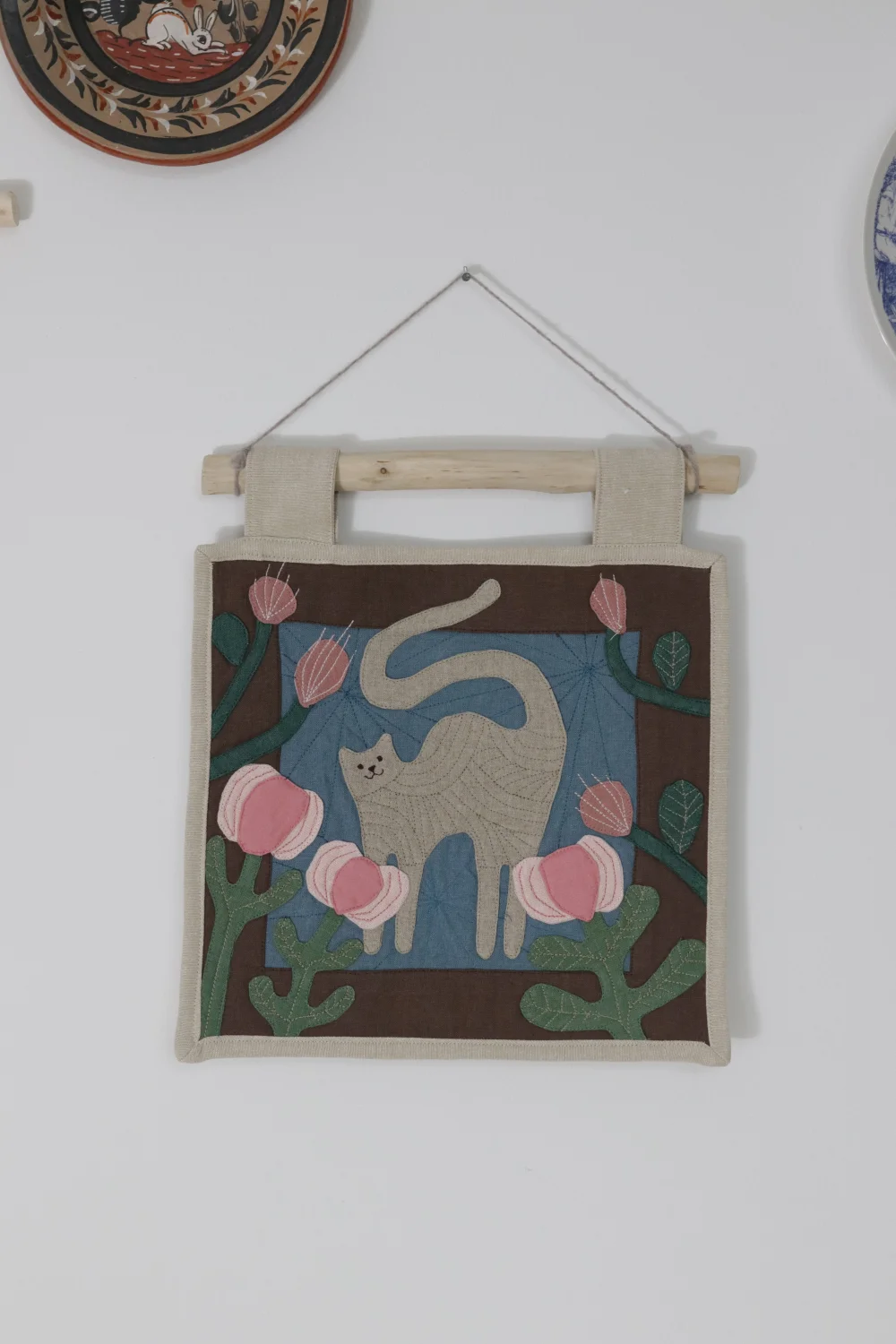 Makatka z burym kotem